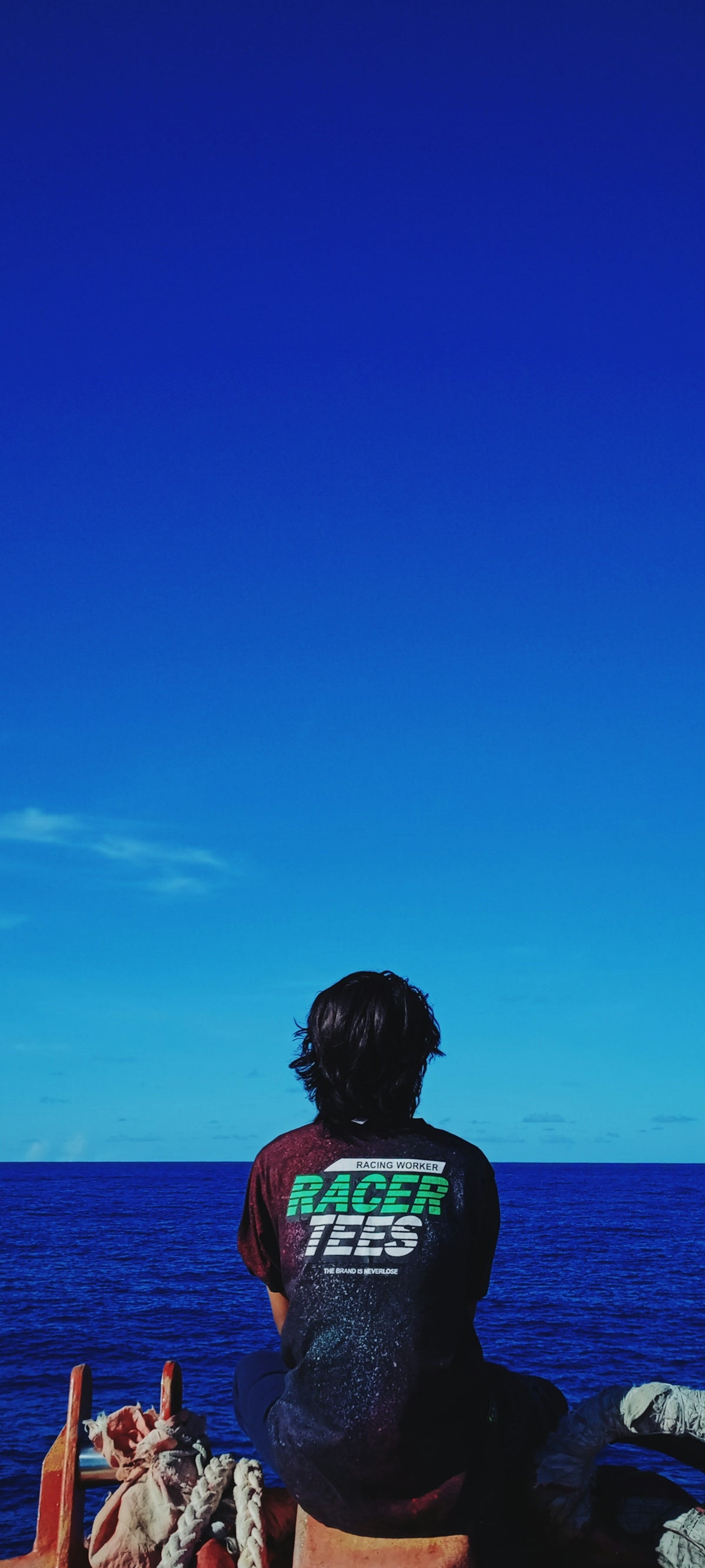 woman in black shirt standing on beach during daytime