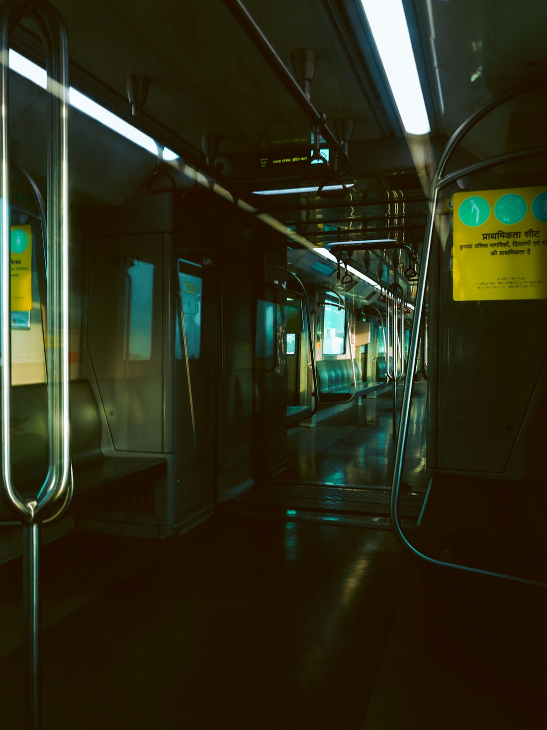 a subway car with its doors open at night