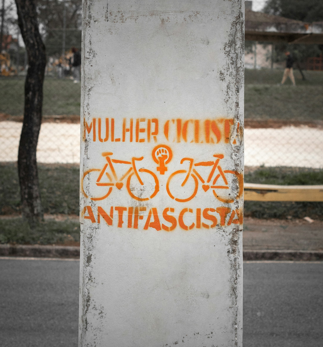 A sign on the side of a road that says mulcher mint antifa