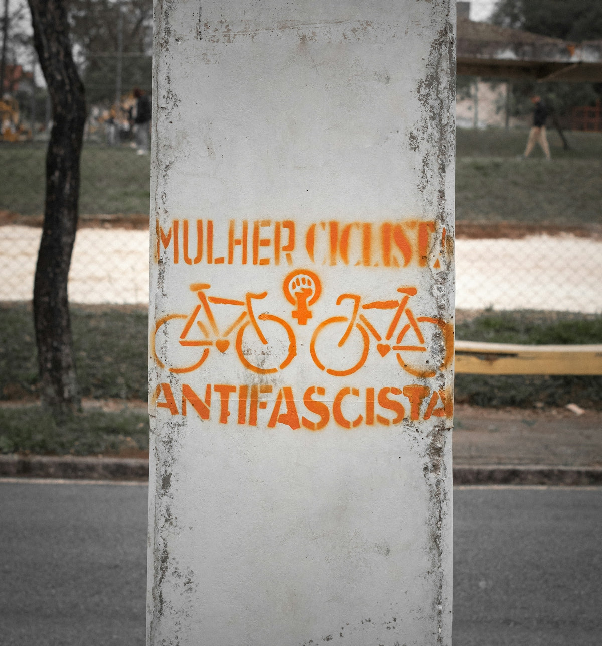 A sign on the side of a road that says mulcher mint antifa