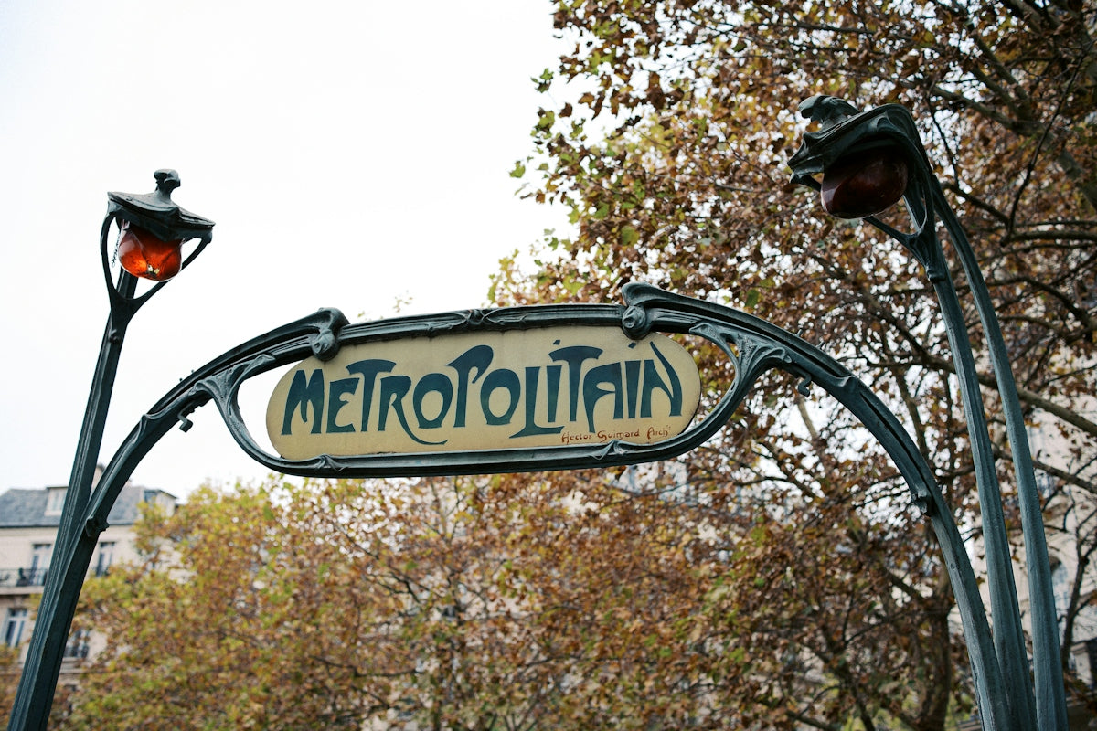 A street sign that says metropolitan on it